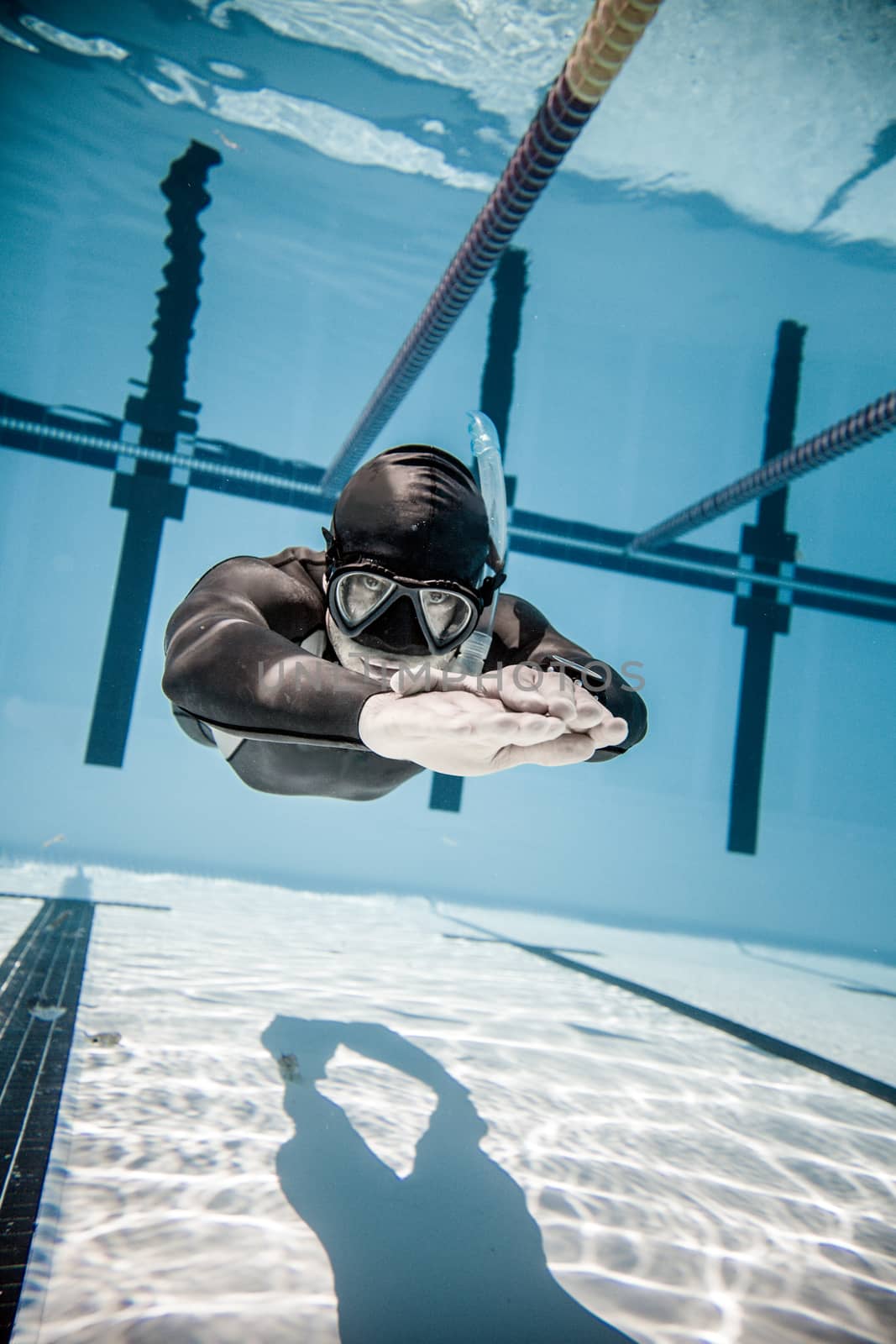 Freediver Performing during a DYN Freediving Competition by aetb