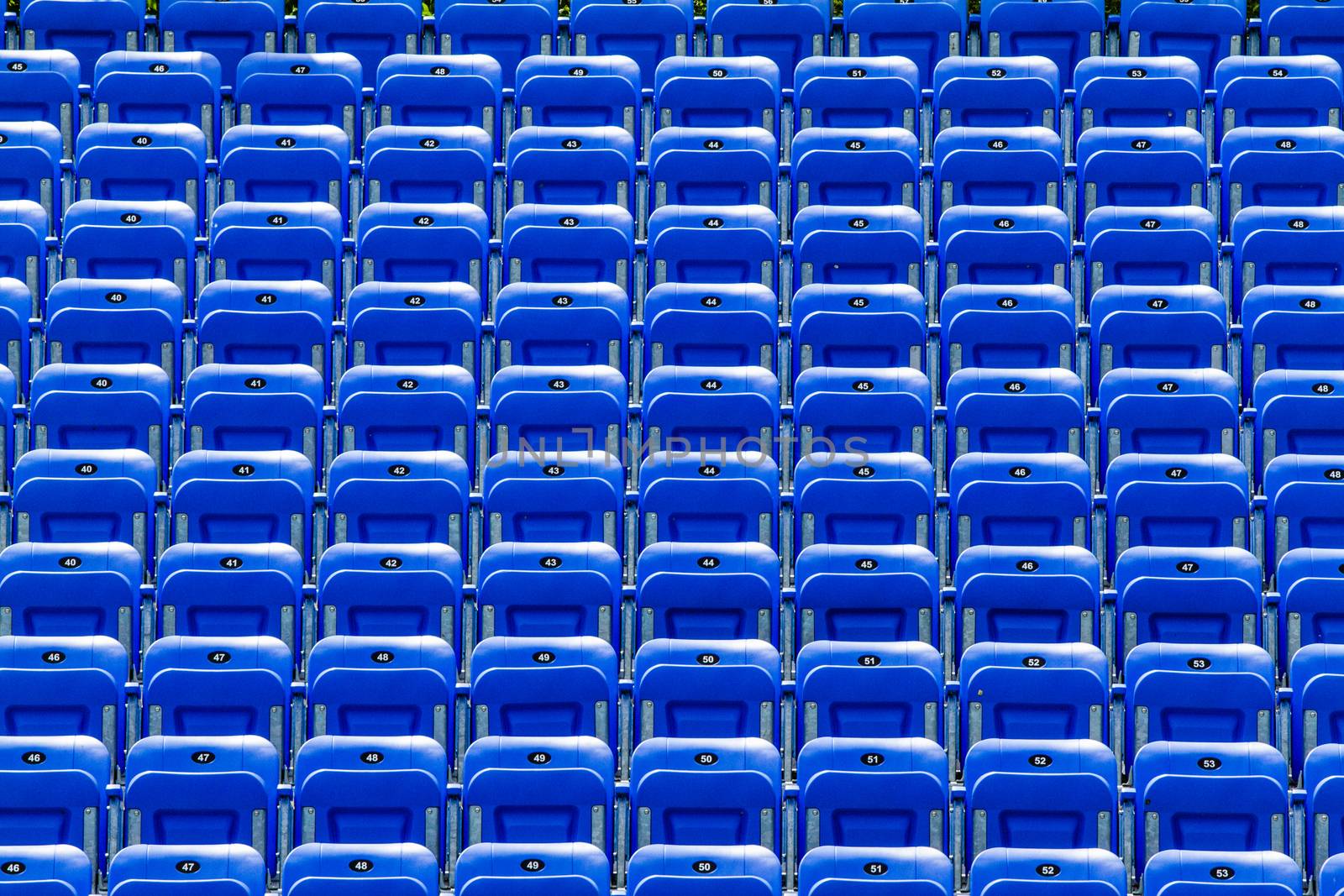 Empty Blue Bleachers Outdoors with Numbers - Nobody