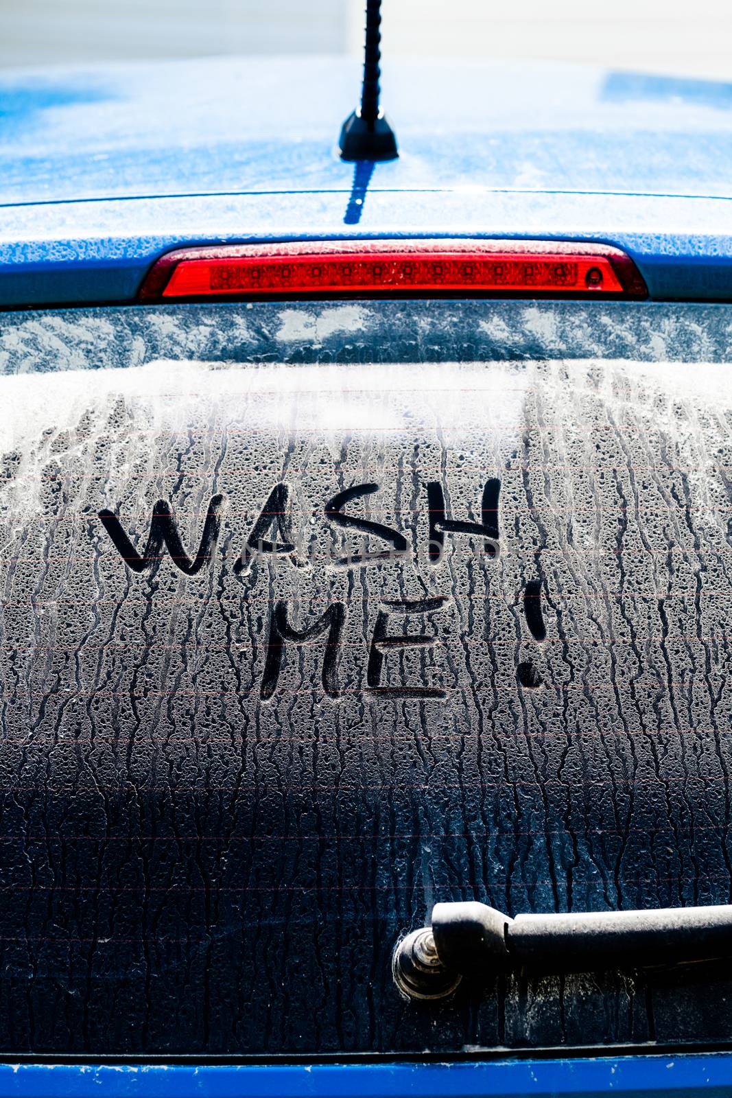 Wash Me Words on a Dirty Car Window by aetb