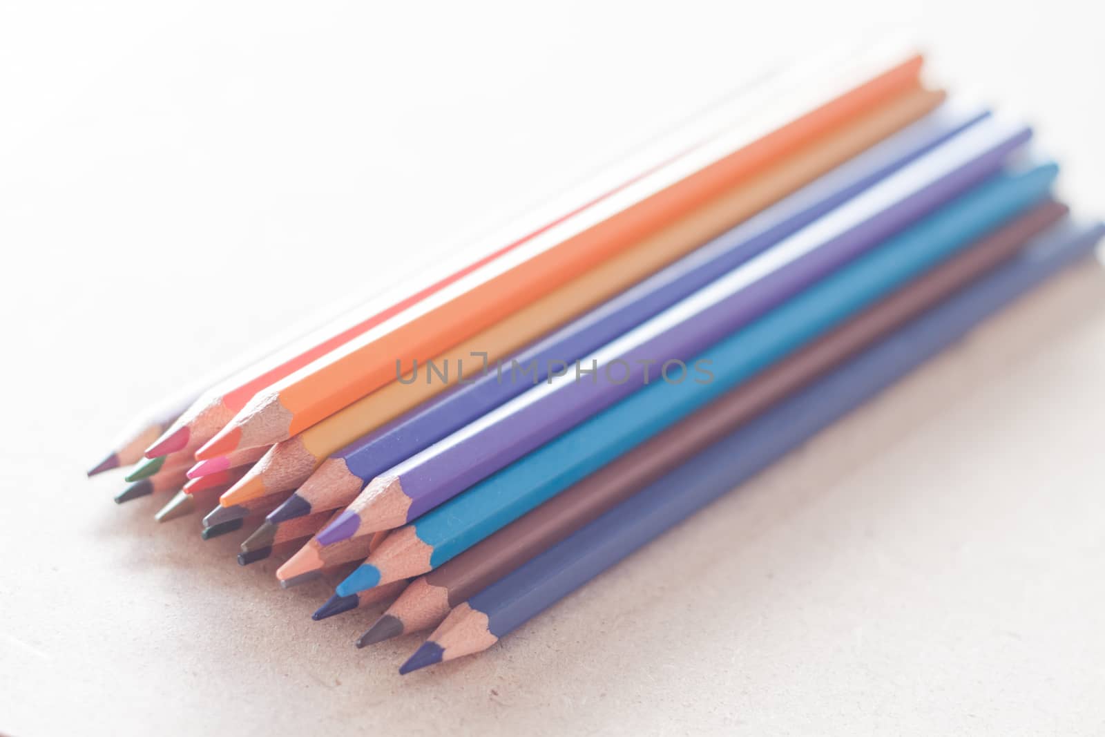 Cluster of colorful pencil crayons, stock photo