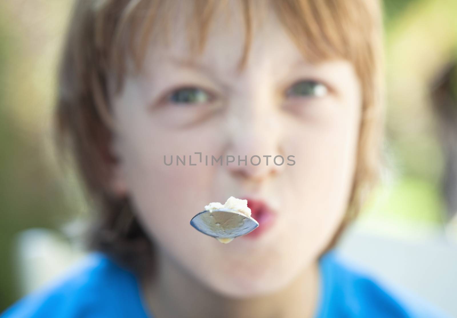 Boy Eating, Fooling Around with Fork