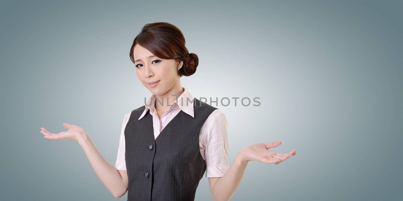 Helpless young business woman shrugs her shoulders. closeup portrait with clipping path.