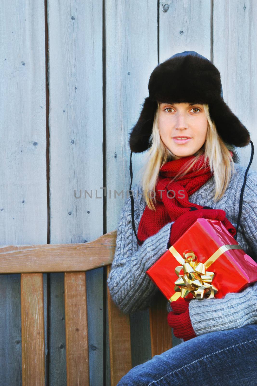 Woman holding Christmas gift