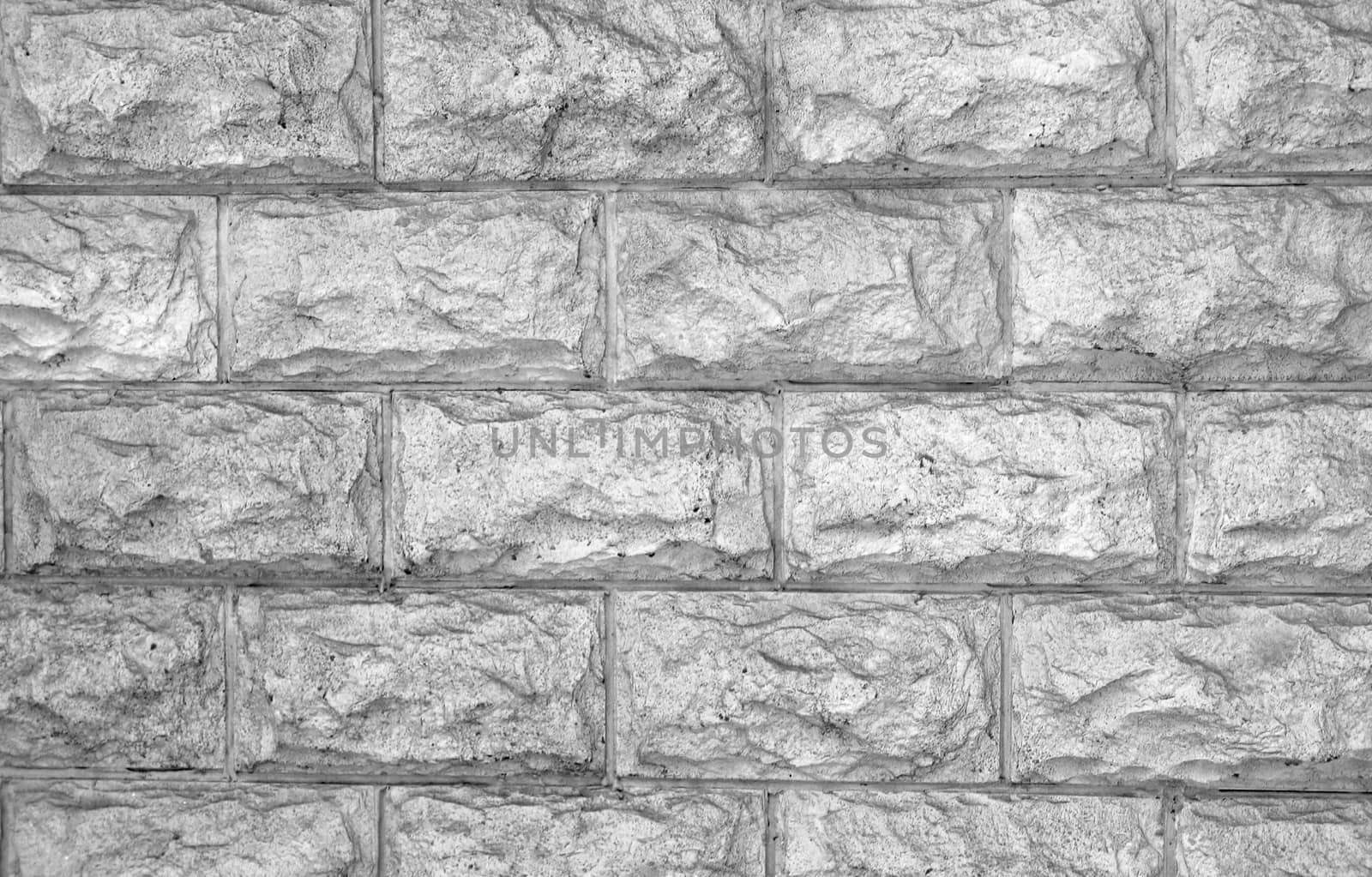 The wall of the large rectangular stones monochrome toned  as a background