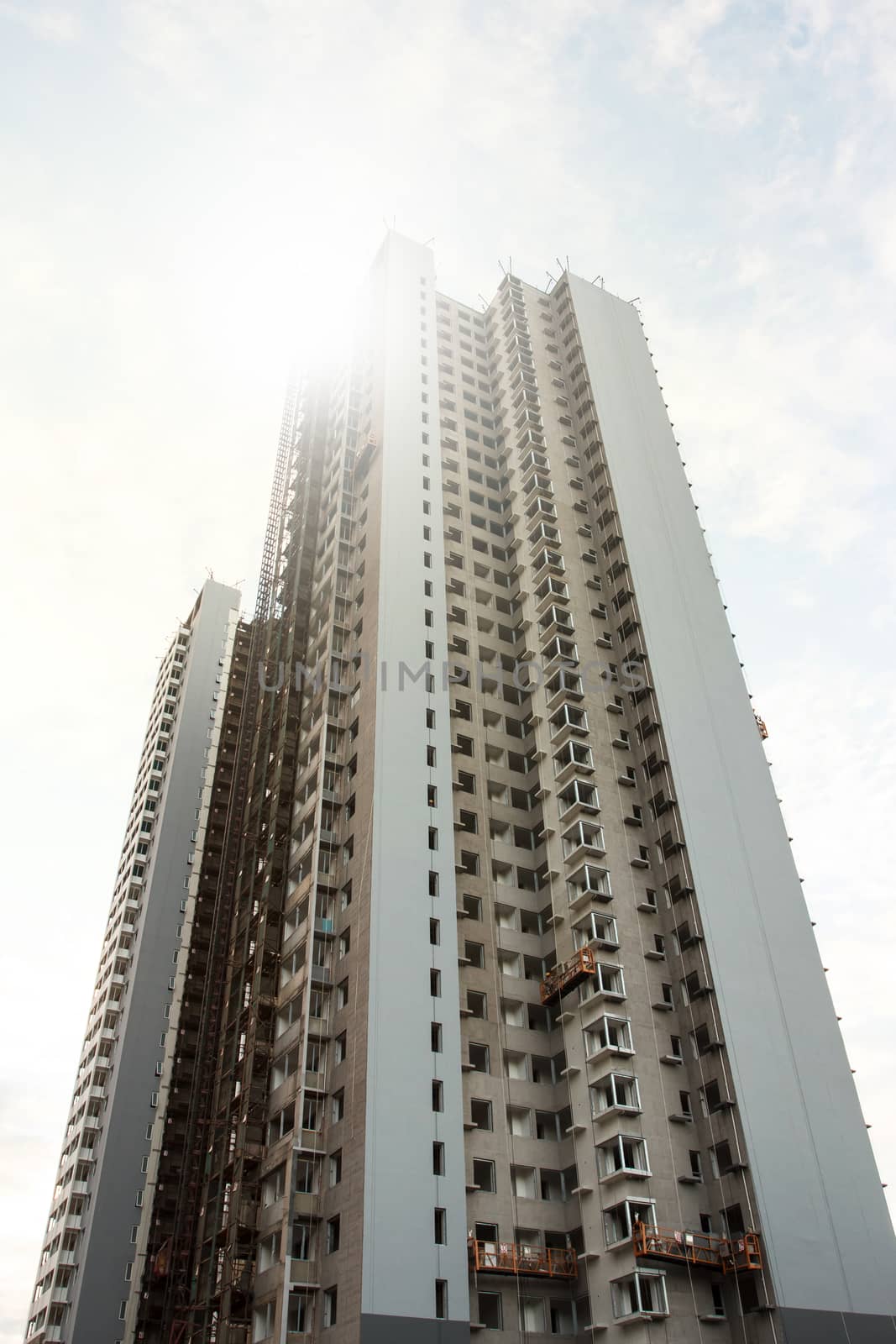 one tall building under construction,low angle