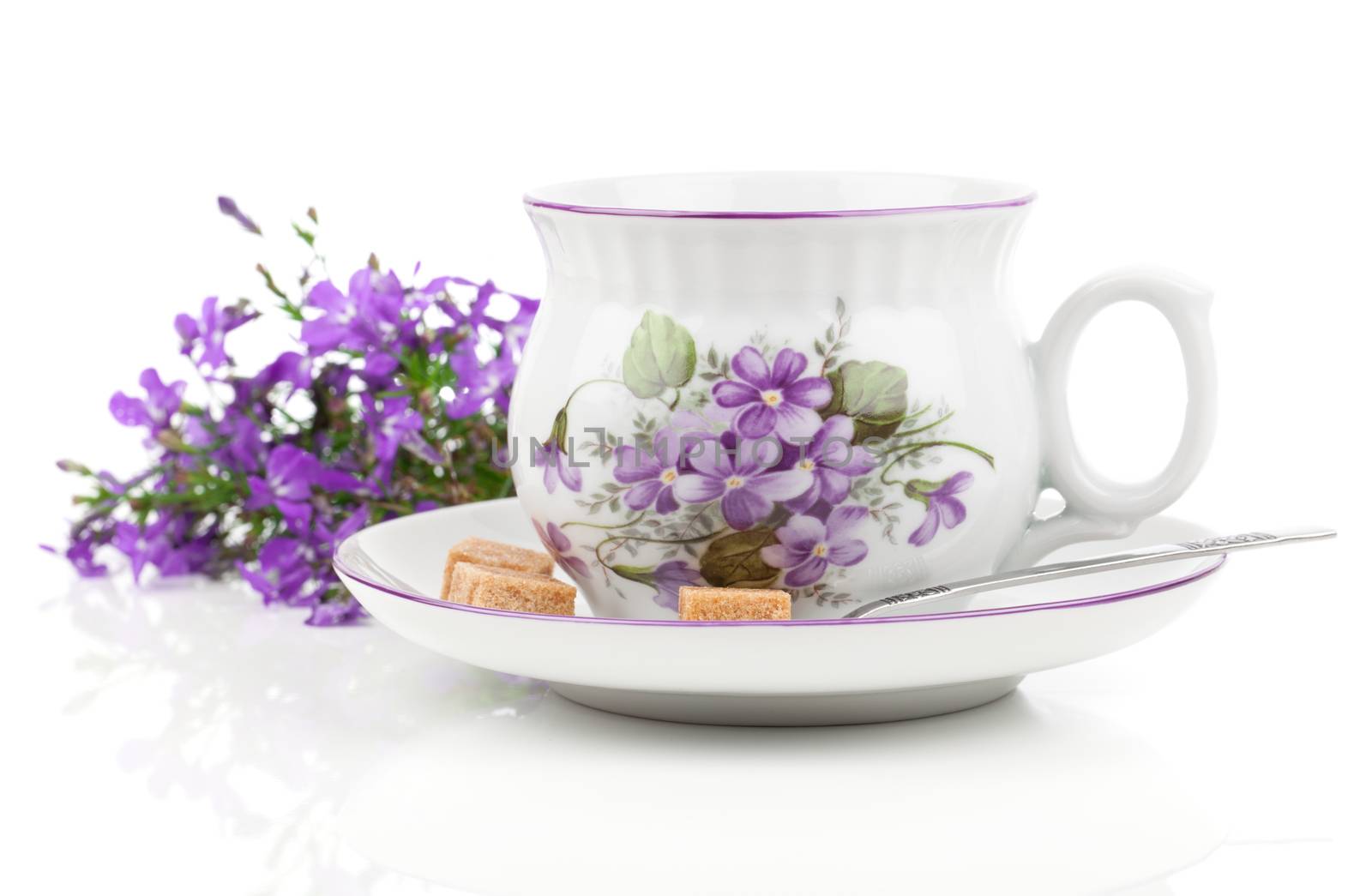 vintage coffee or tea cups, with blue flowers isolated over white background
