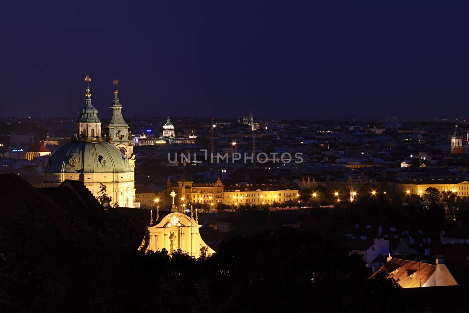 Photo shows details of Prague city at night.