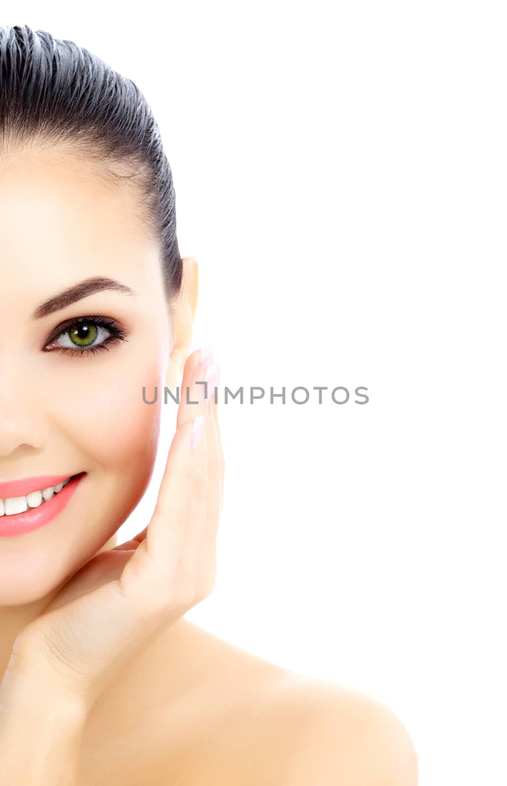 Cheerful female with fresh clear skin, white background