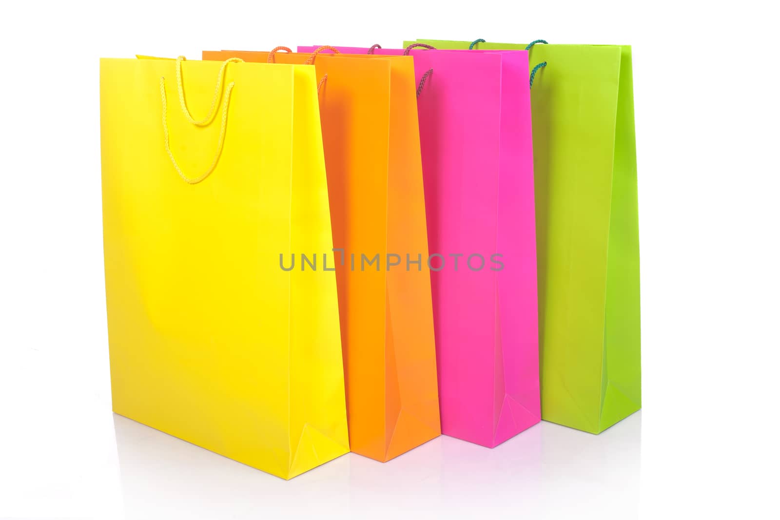 Colour paper packages on white background