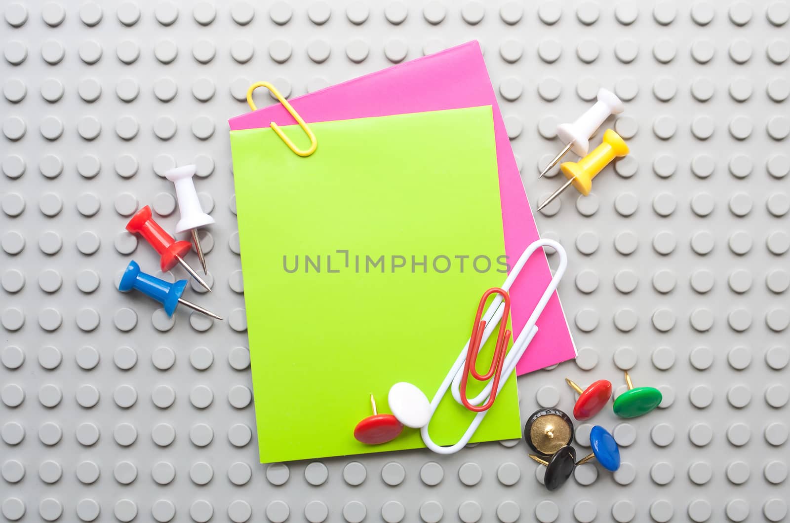 Office accessories on  grey textural background