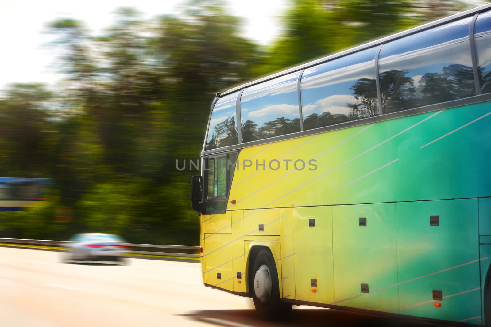 bus tourist moves on motorway in the afternoon