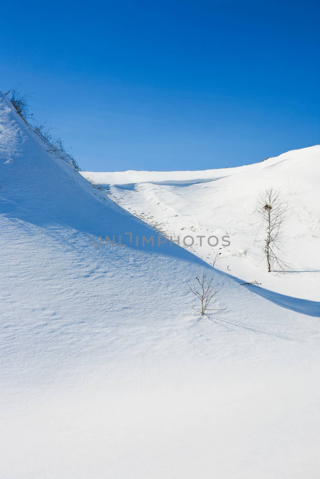 Beautiful winter landscape with snow-covered hills