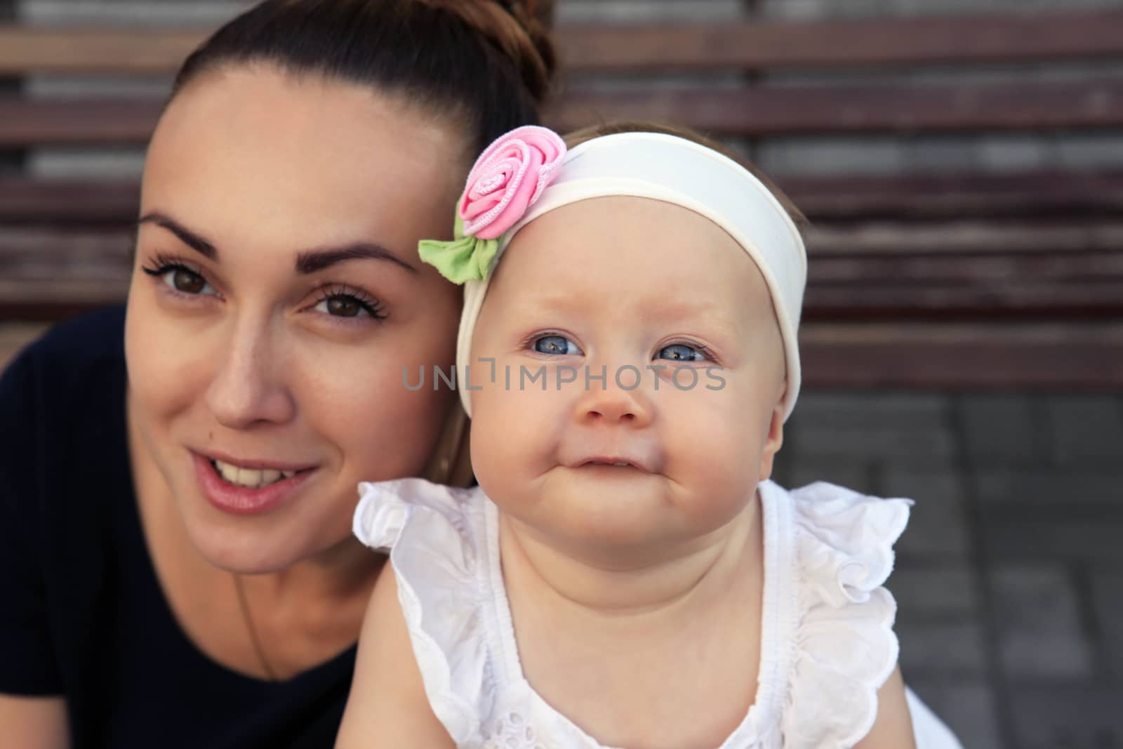 Happy mother and daughter by friday