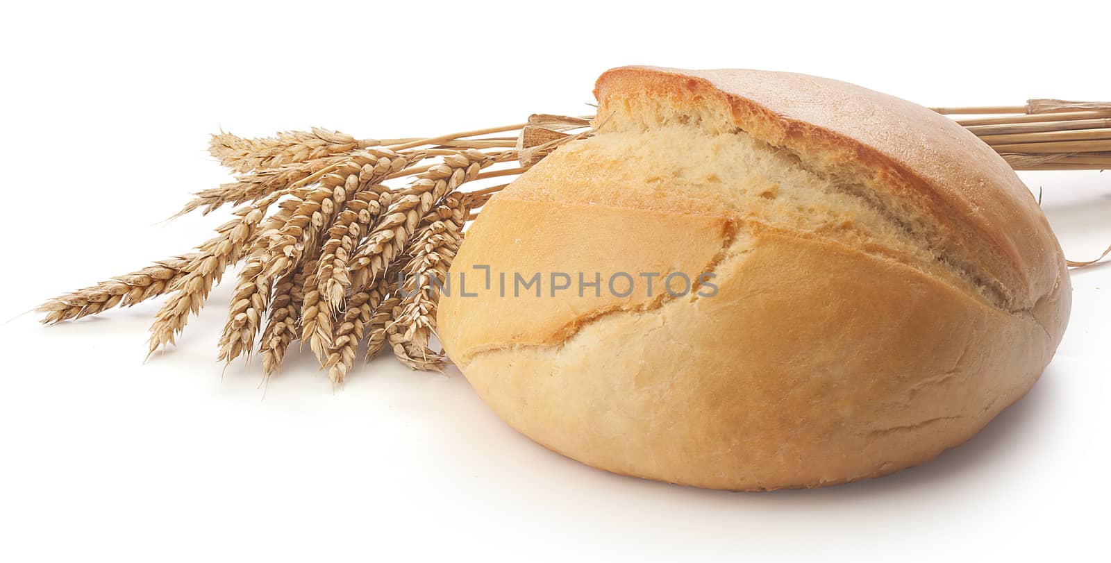 Ukrainian round bread with wisp of wheat on the white background