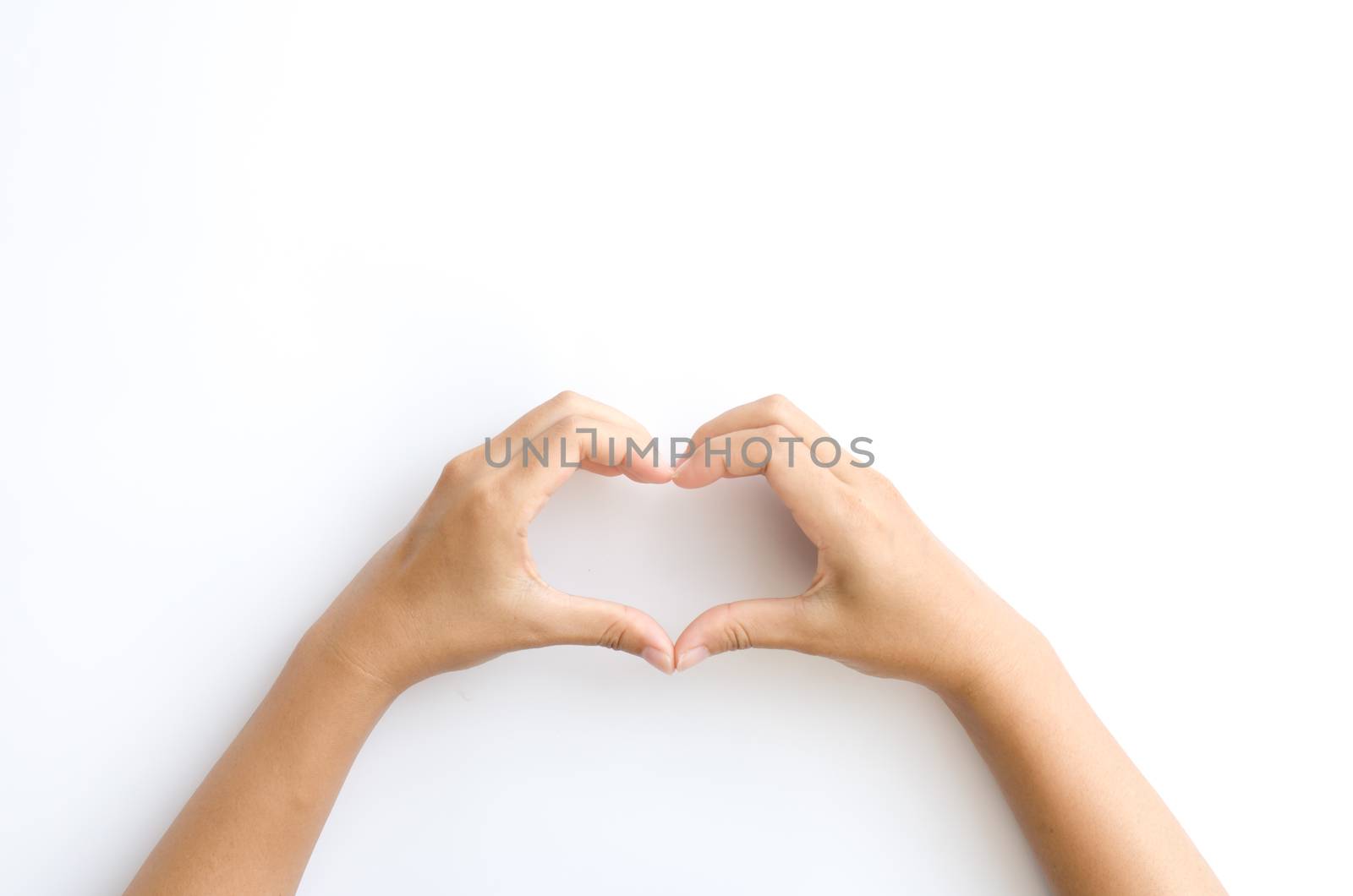 asia female hands in the form of heart on a white background