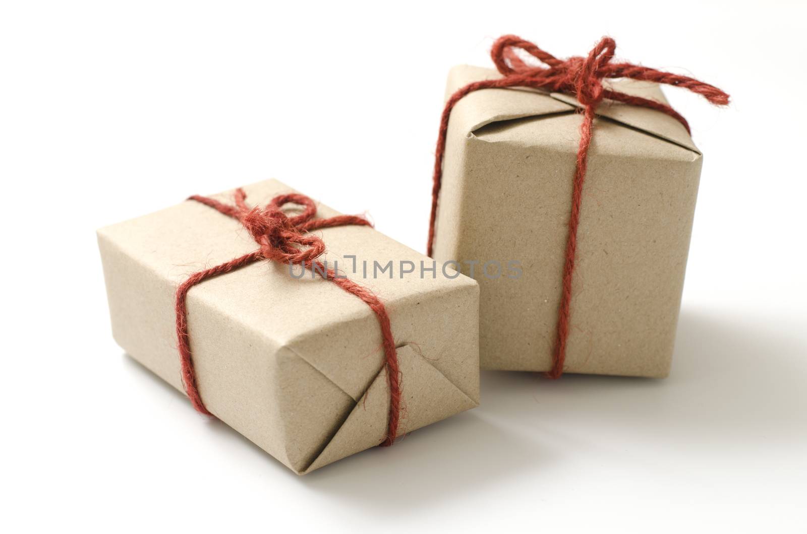 two craft cardboard gift boxes on a white background