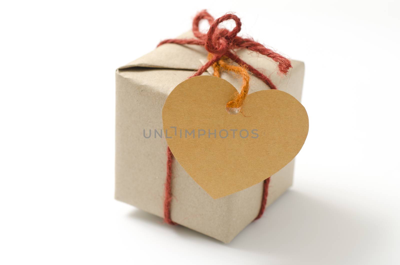 heart tag with single craft cardboard gift box on a white background