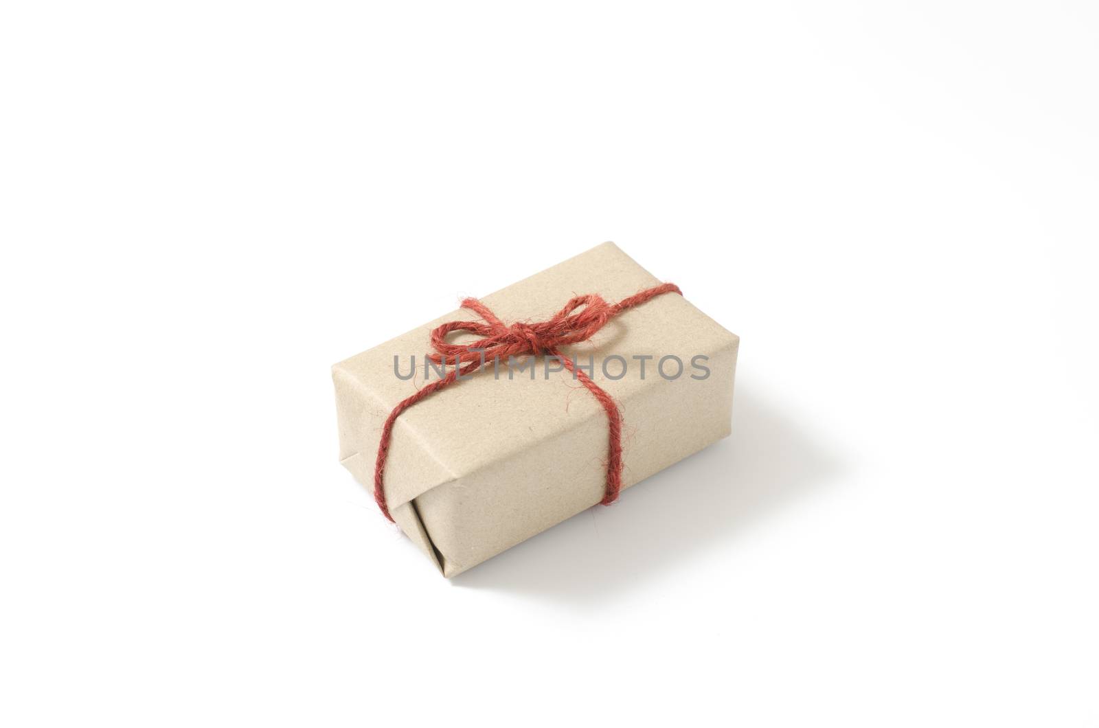 single craft cardboard gift box on a white background