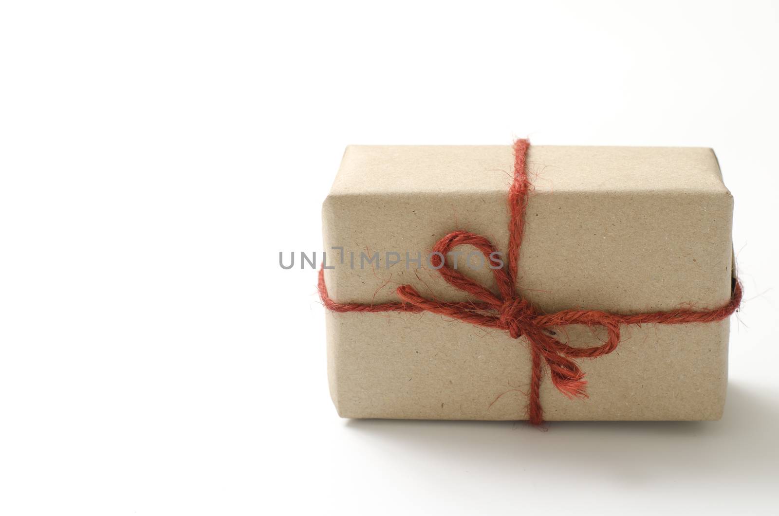 single craft cardboard gift box on a white background