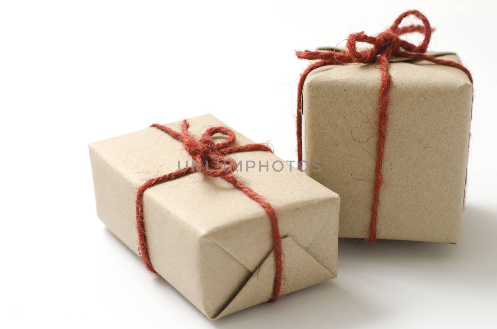 two craft cardboard gift boxes on a white background