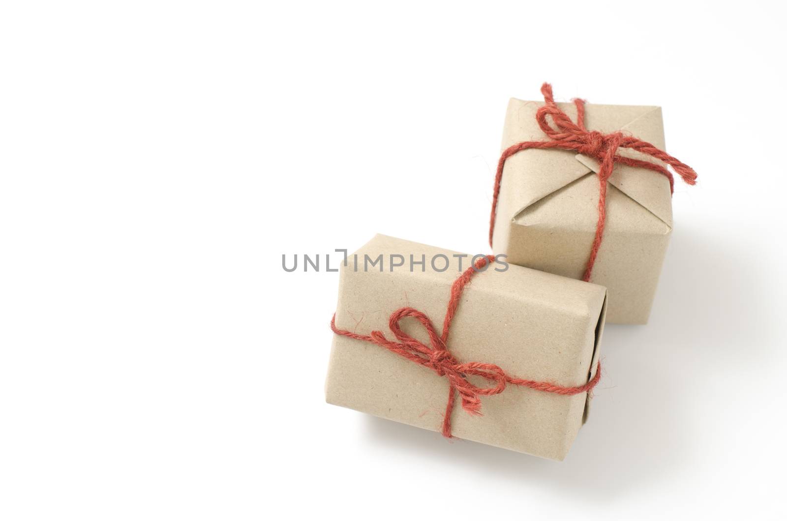 two craft cardboard gift boxes on a white background