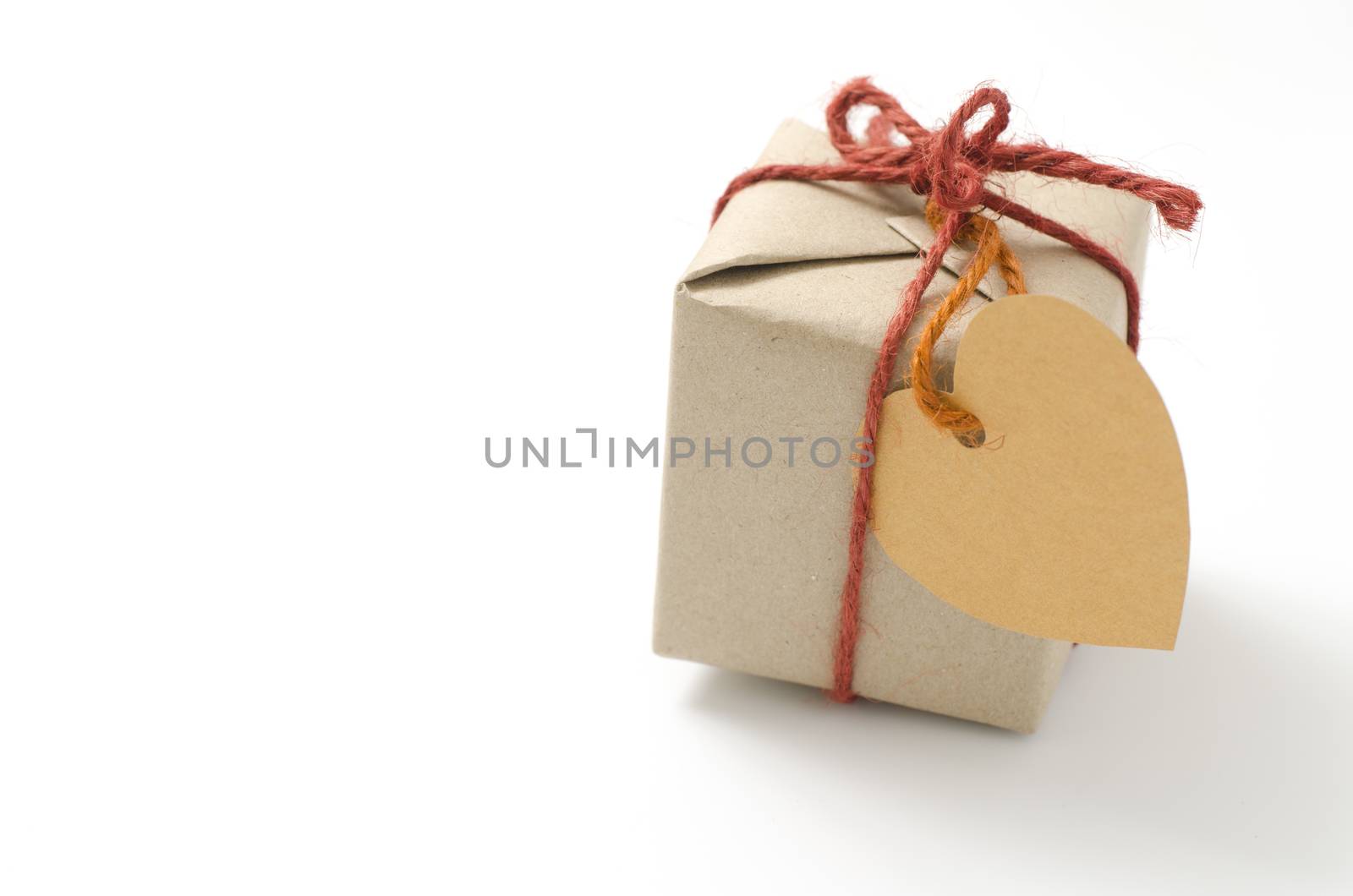heart tag with single craft cardboard gift box on a white background