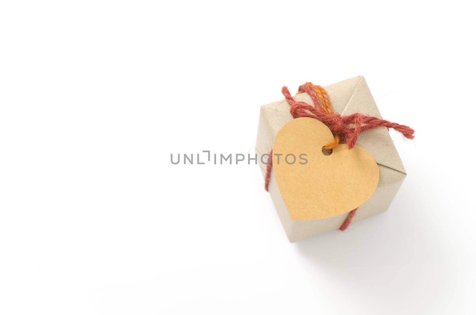 heart tag with single craft cardboard gift box on a white background