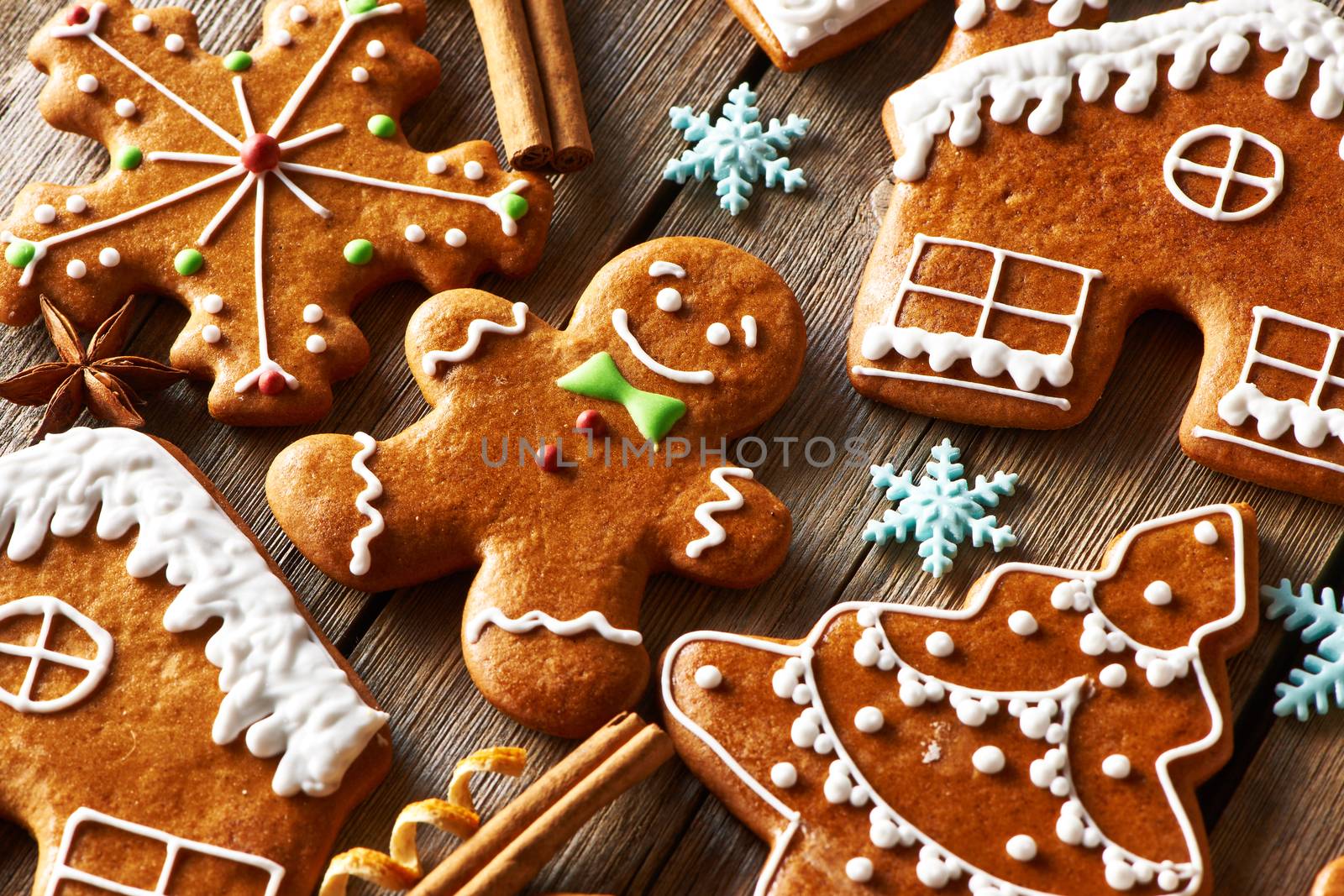 Christmas homemade gingerbread cookies on wooden table