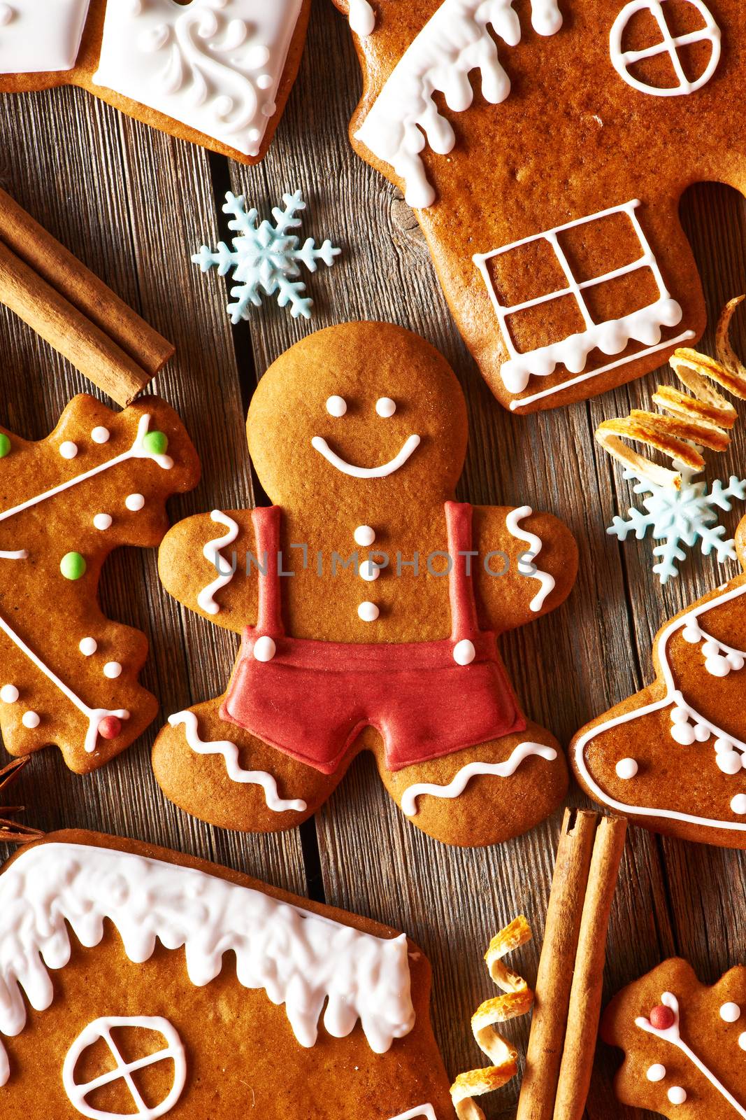 Christmas homemade gingerbread cookies on wooden table