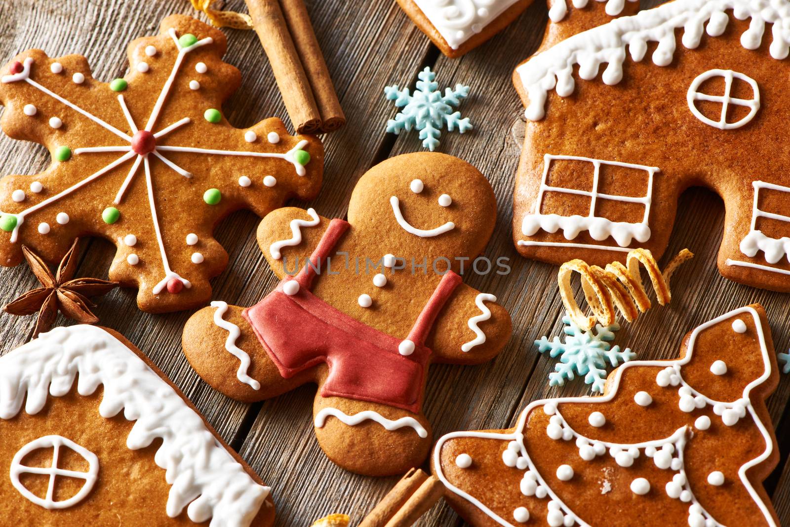 Christmas homemade gingerbread cookies on wooden table