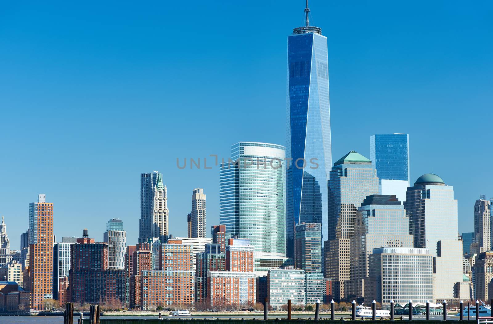 New York City Manhattan skyline with One World Trade Center Tower (AKA Freedom Tower) over Hudson River viewed from New Jersey