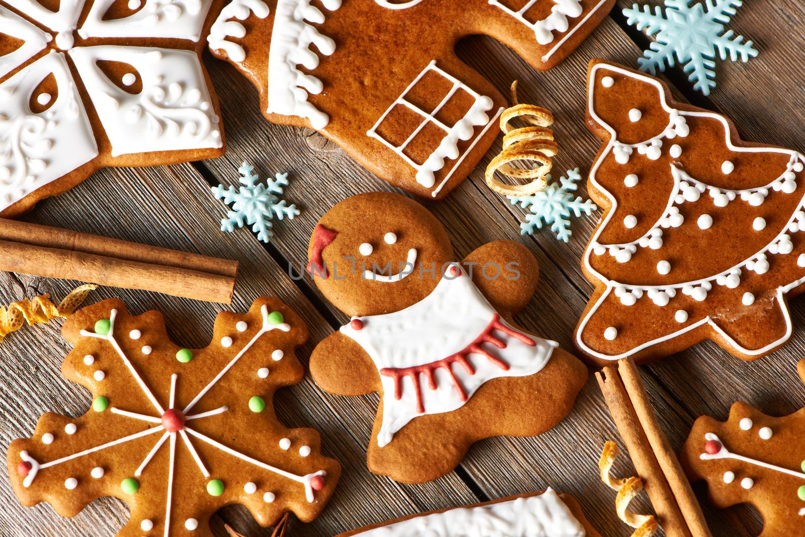 Christmas homemade gingerbread cookies on wooden table