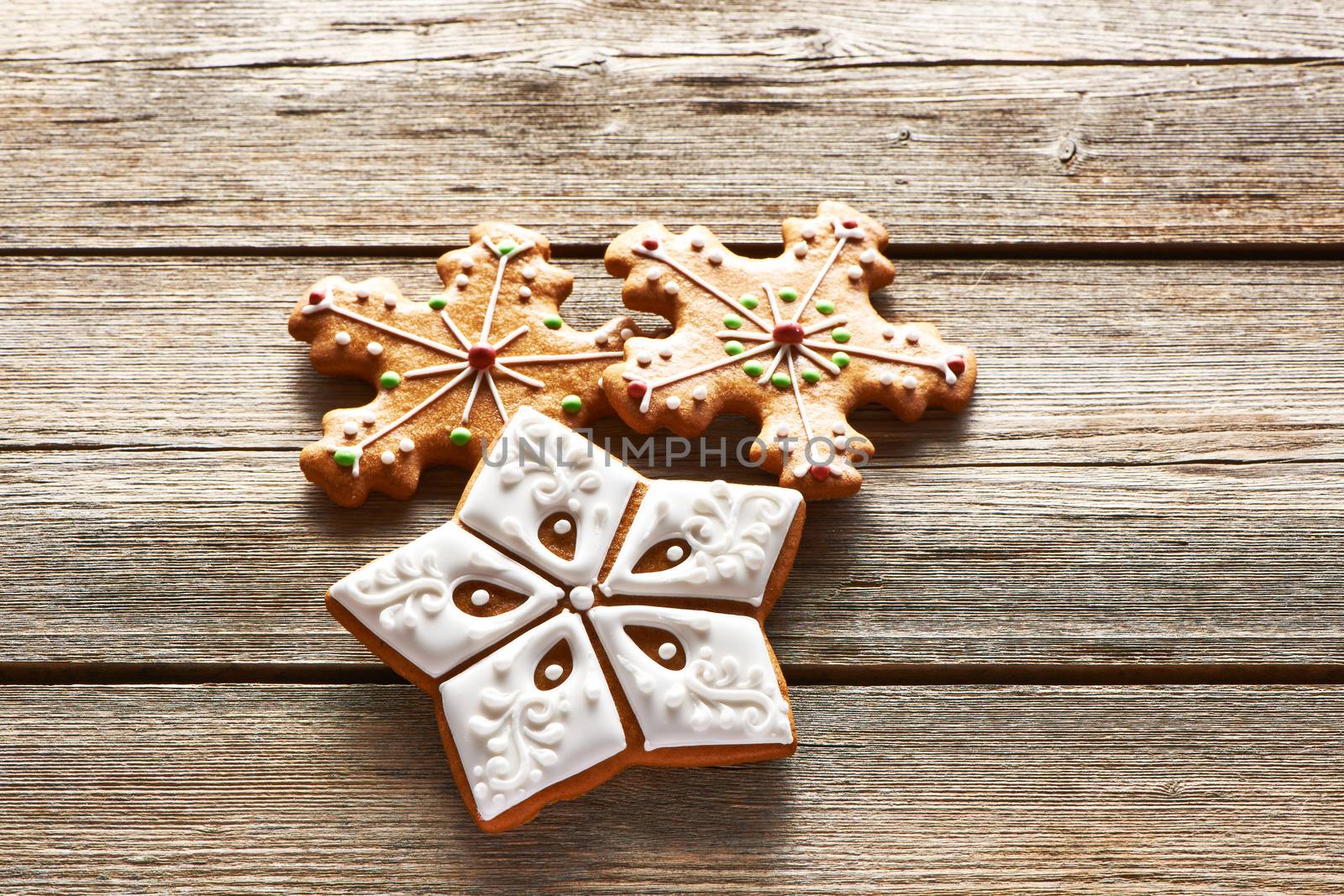 Christmas homemade gingerbread cookies on wooden table