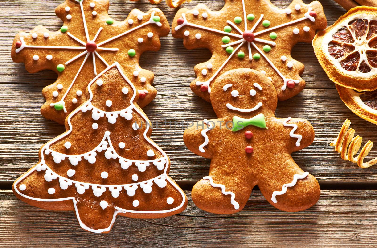 Christmas homemade gingerbread cookies on wooden table