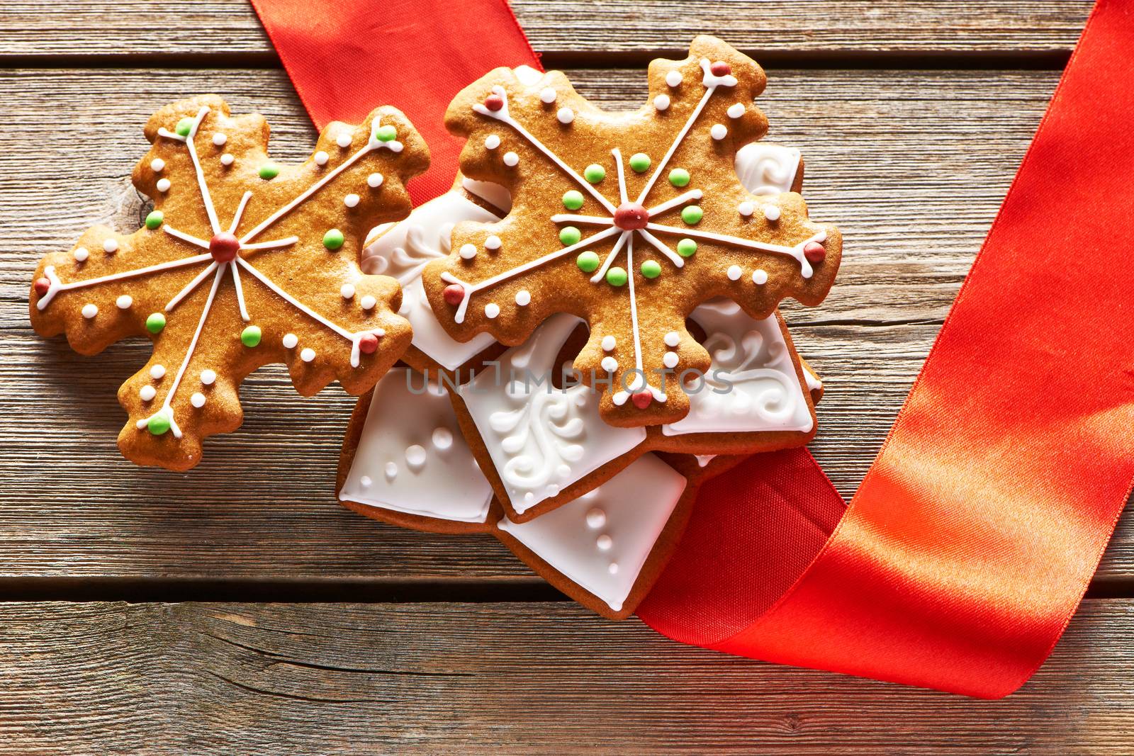 Christmas homemade gingerbread cookies on wooden table