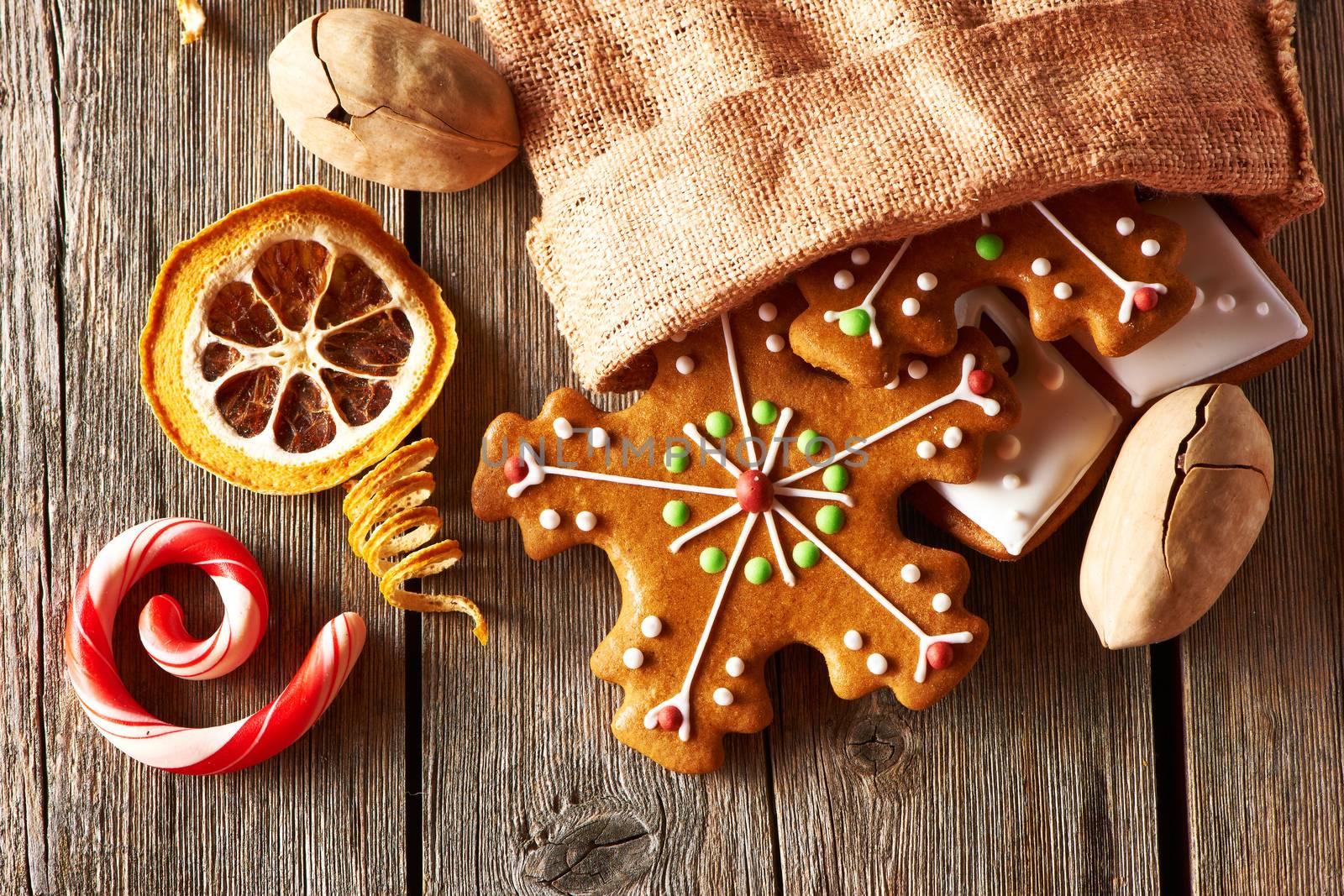 Christmas homemade gingerbread cookies on wooden table