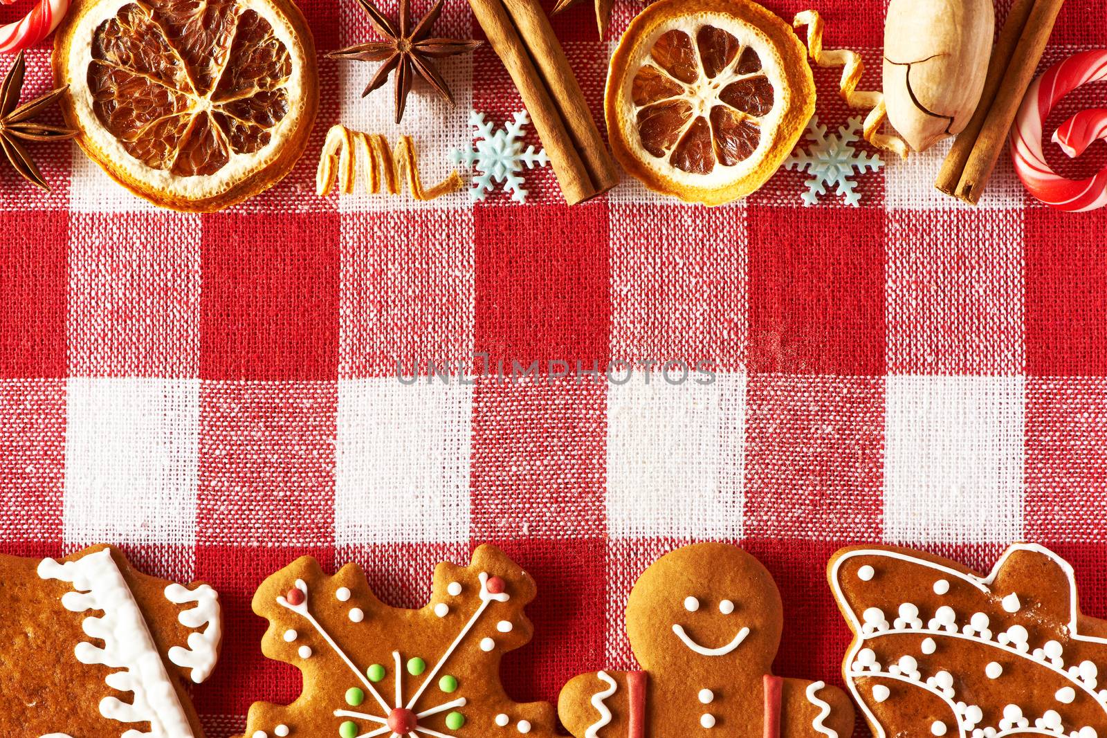 Christmas homemade gingerbread cookies on tablecloth