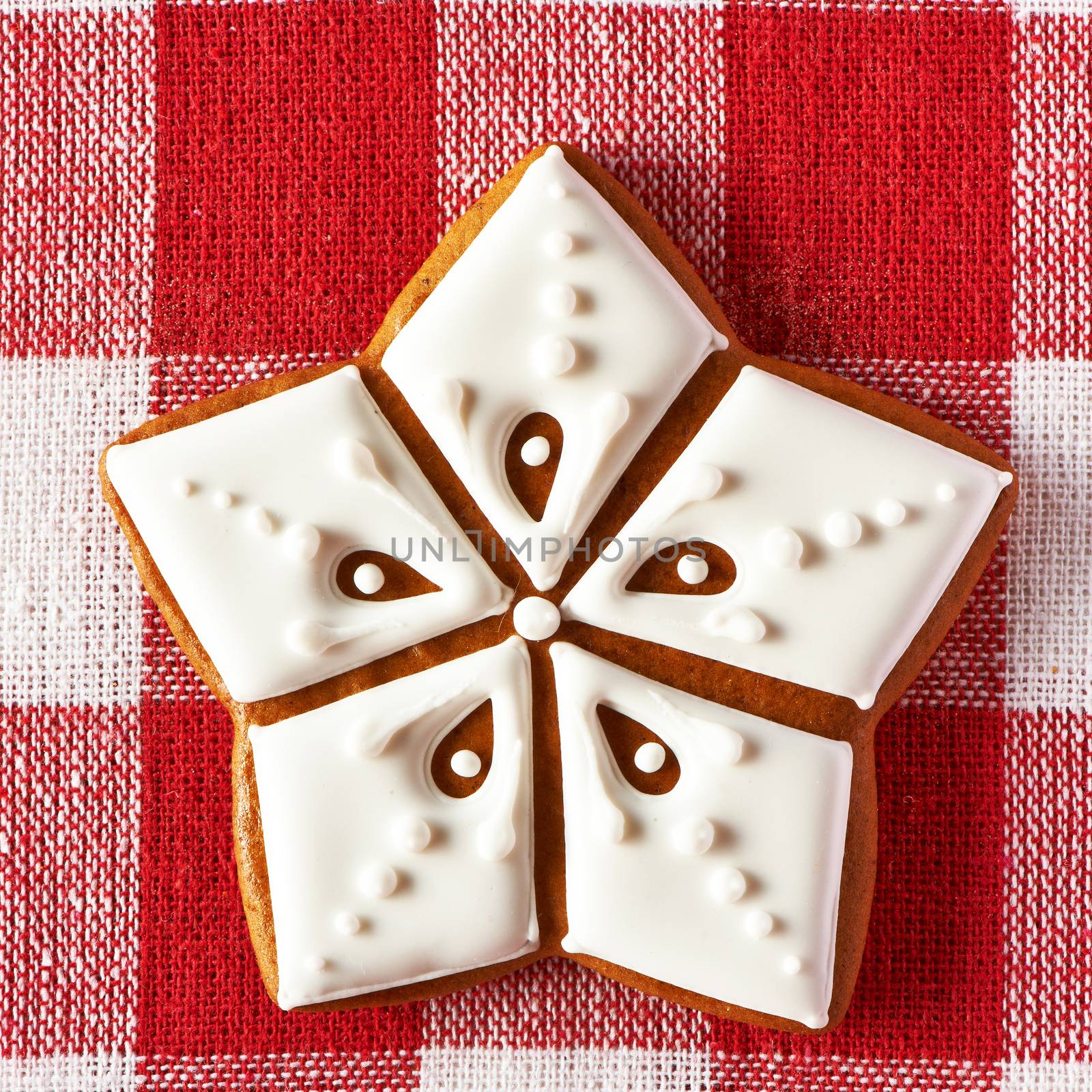 Christmas homemade gingerbread cookie on tablecloth