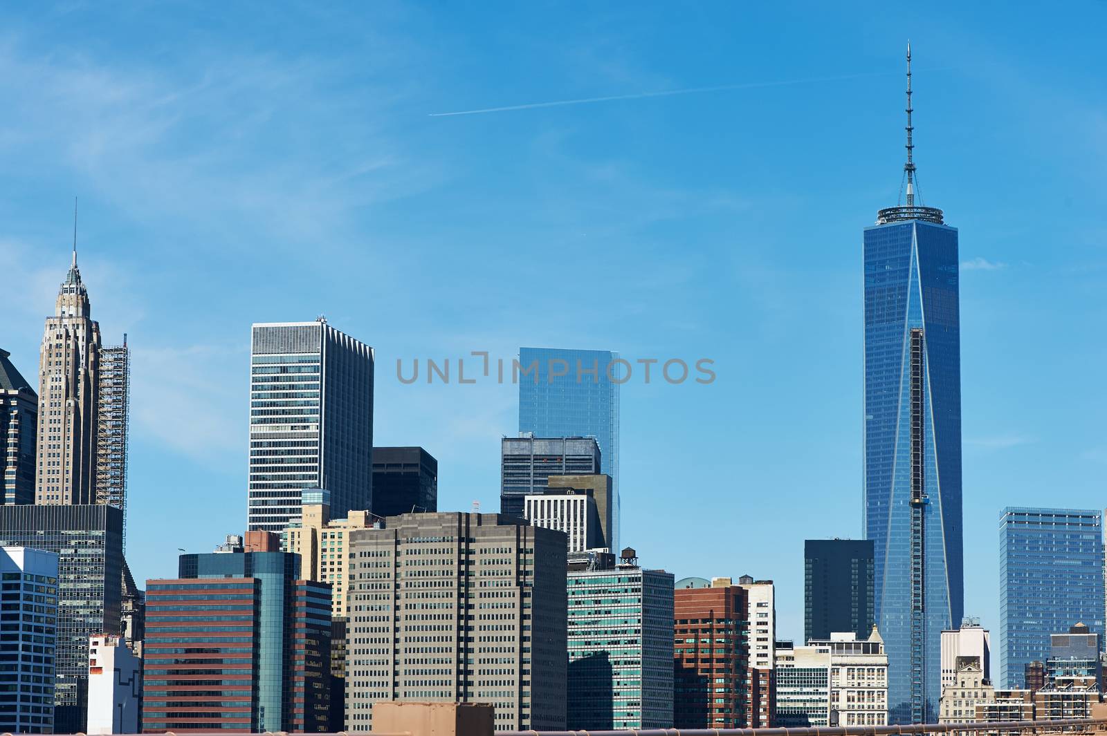 Lower Manhattan skyline view from Brooklyn Bridge in New York City