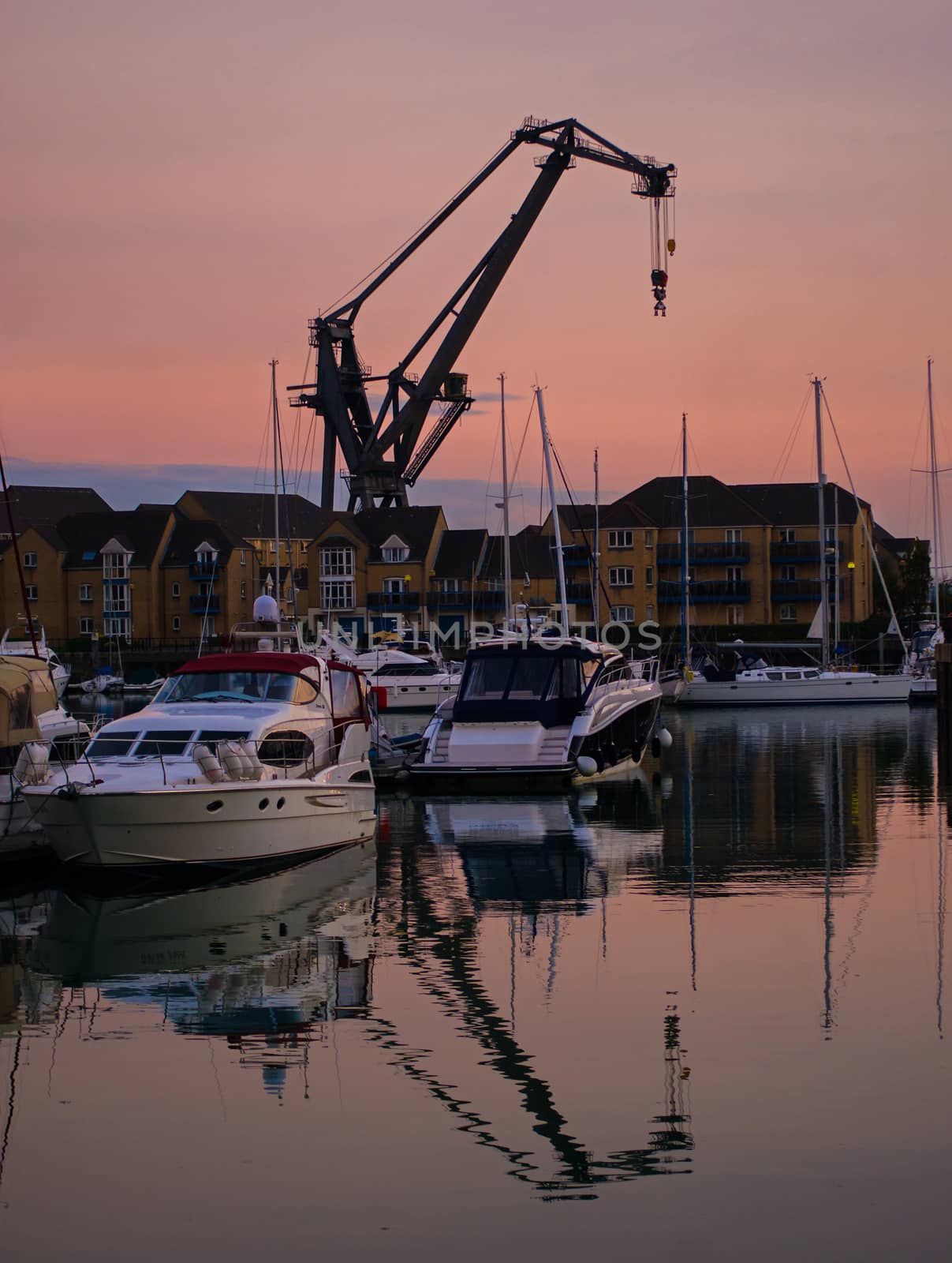 Dockside crane silhouetted by gary_parker