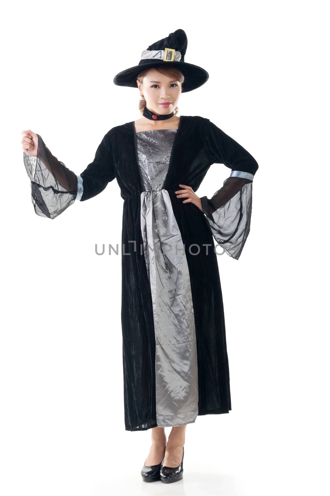 Asian witch hold something, full length portrait isolated on white.
