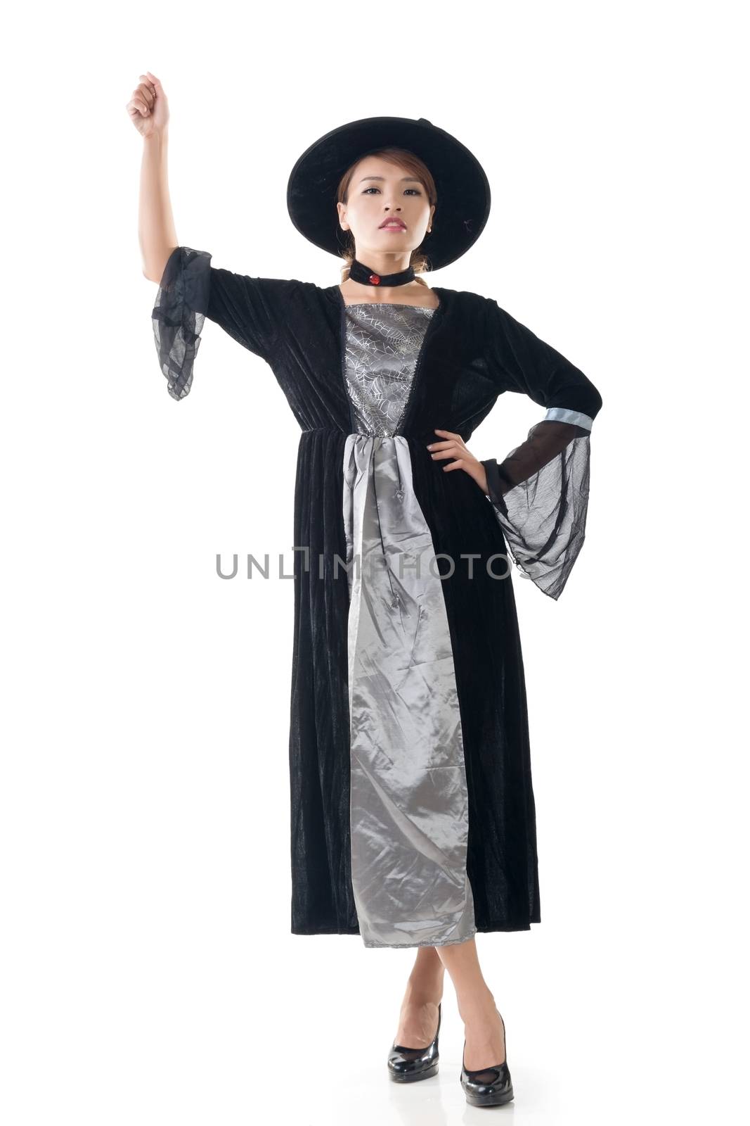 Asian witch hold something, full length portrait isolated on white.