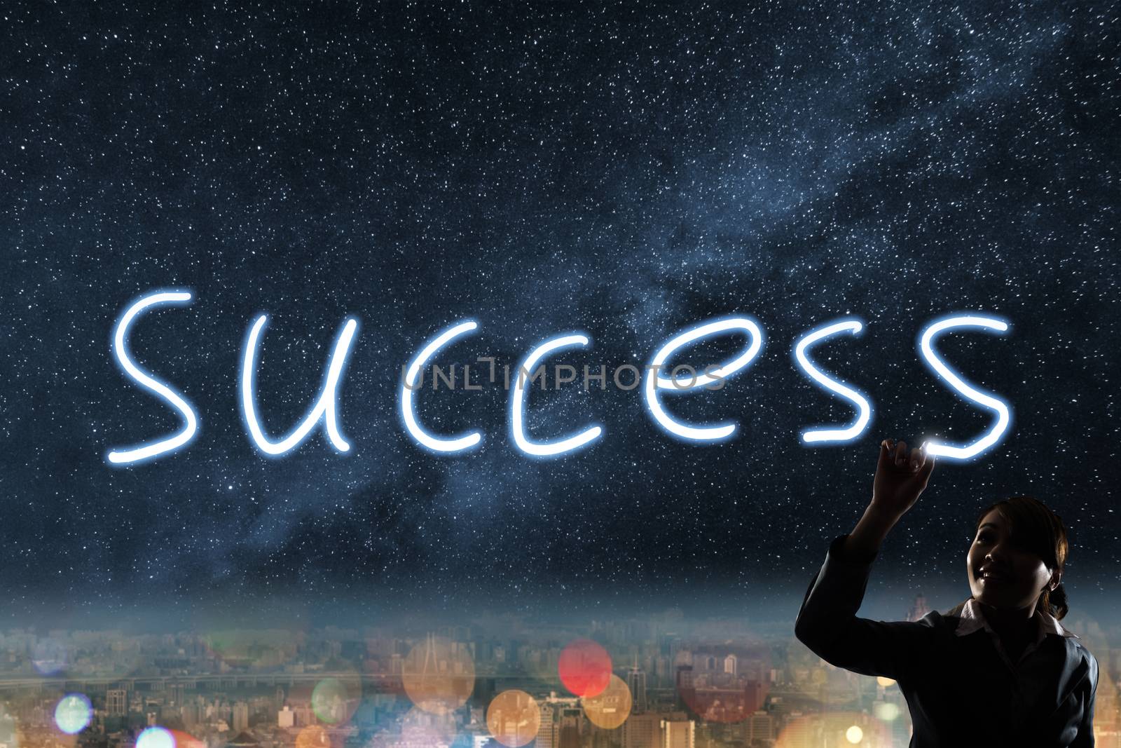 Concept of success, silhouette asian business woman light drawing.