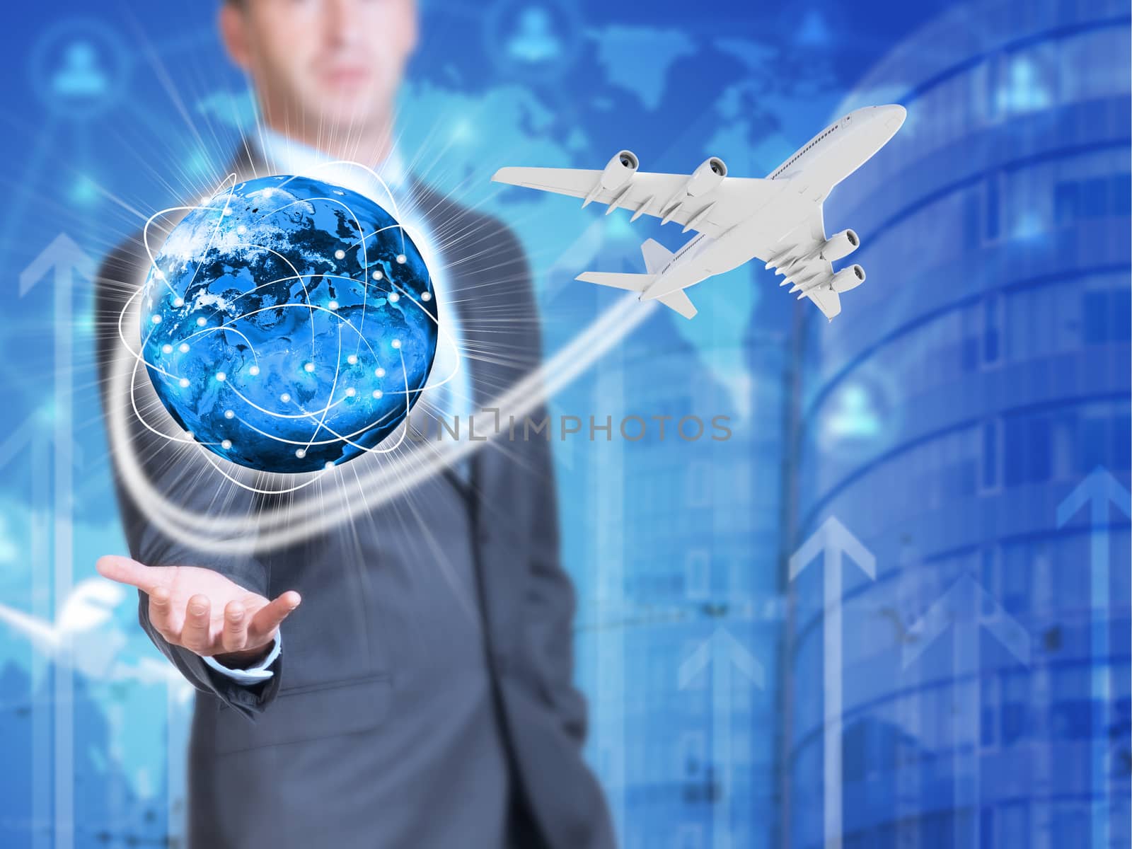 Businessman holding earth. Buildings as backdrop. Element of this image furnished by NASA