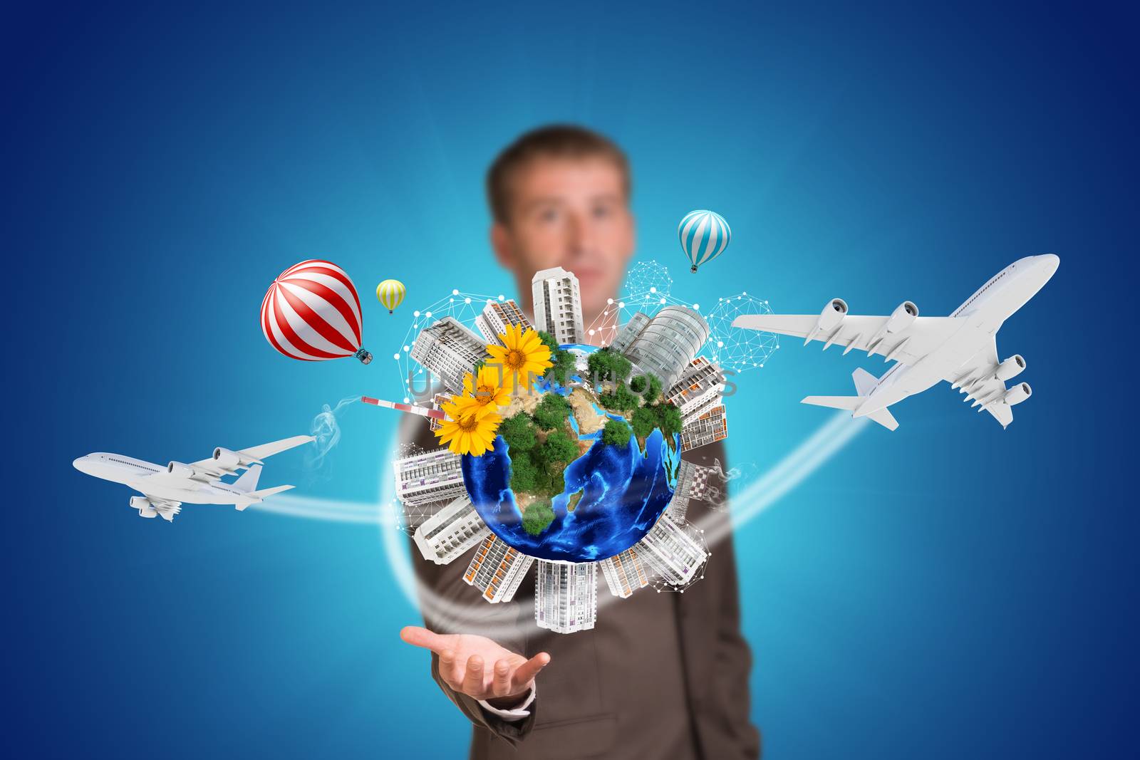 Businessman holding earth with buildings. Element of this image furnished by NASA