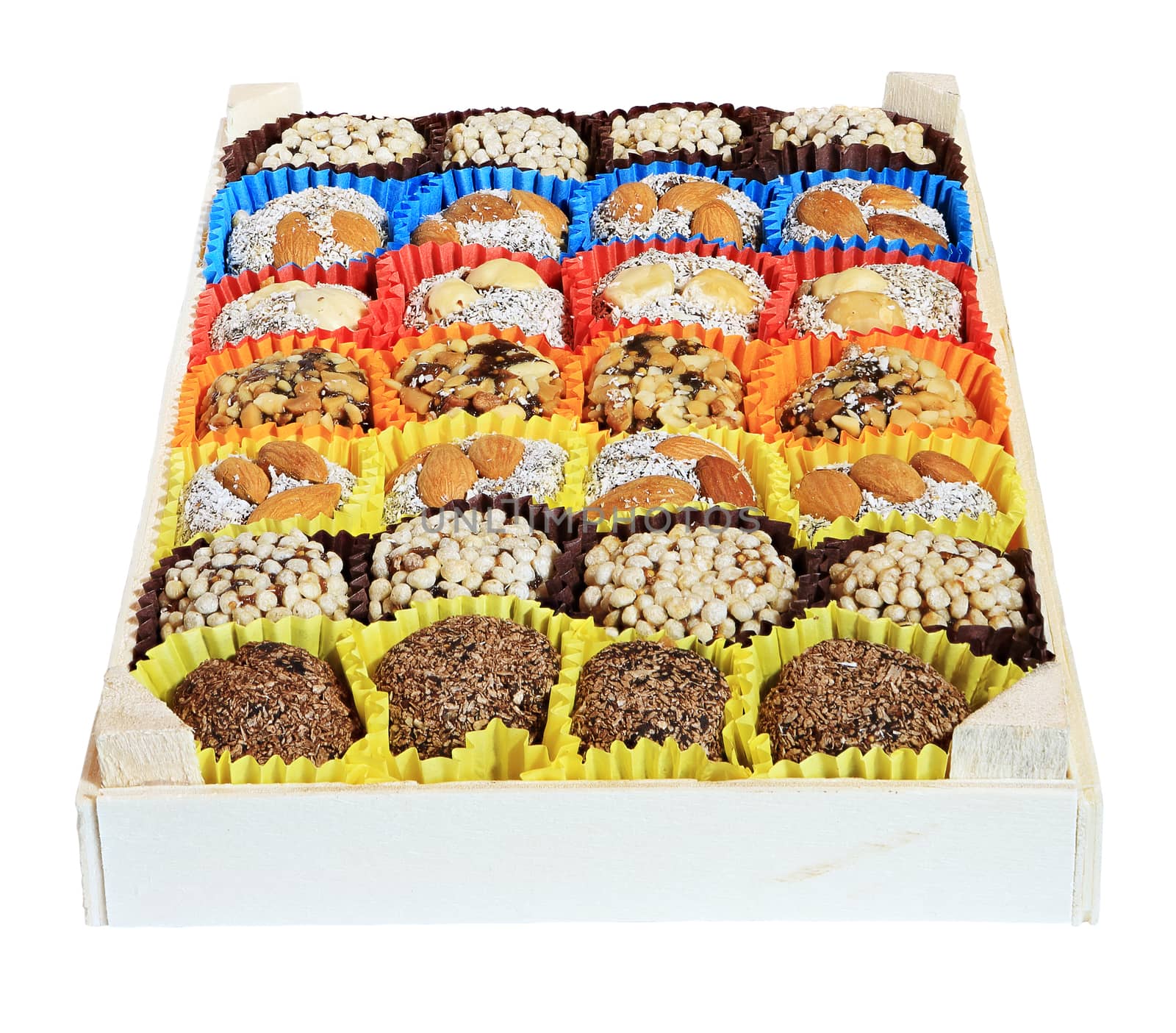 Turkish sweets, candies in a wooden box on the white background
