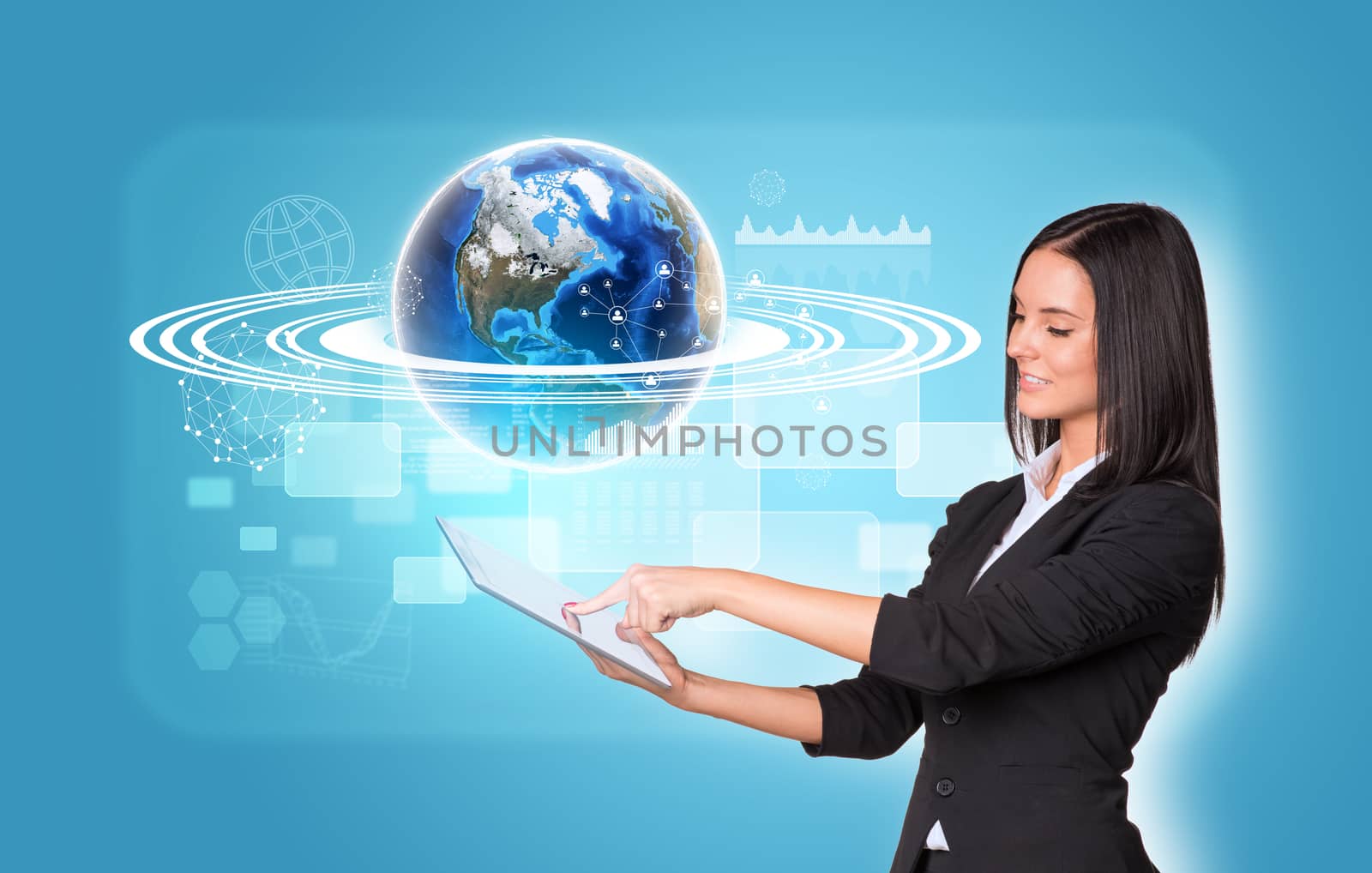 Beautiful businesswomen in suit using digital tablet. Earth with transparent rectangles, graphs and network. Element of this image furnished by NASA