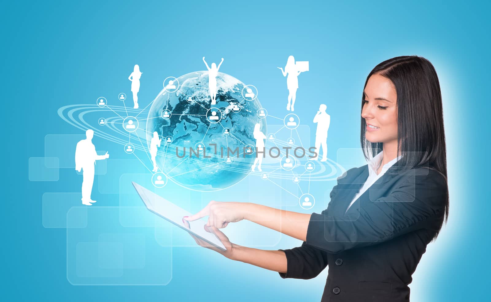 Beautiful businesswomen in suit using digital tablet. Earth with silhouettes of business people. Element of this image furnished by NASA