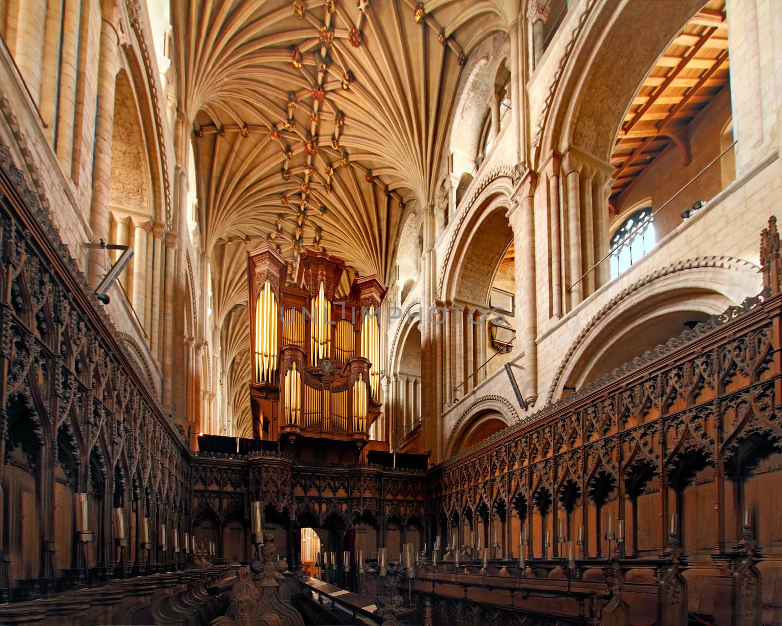 Norwich Cathedral interior, showing some of the beautiful 12th century architecture, the organ pipes and quire stalls.