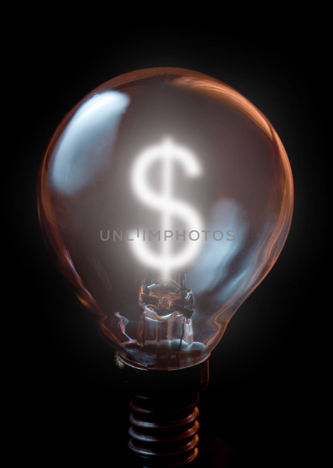 Dollar currency symbol illuminated light bulb